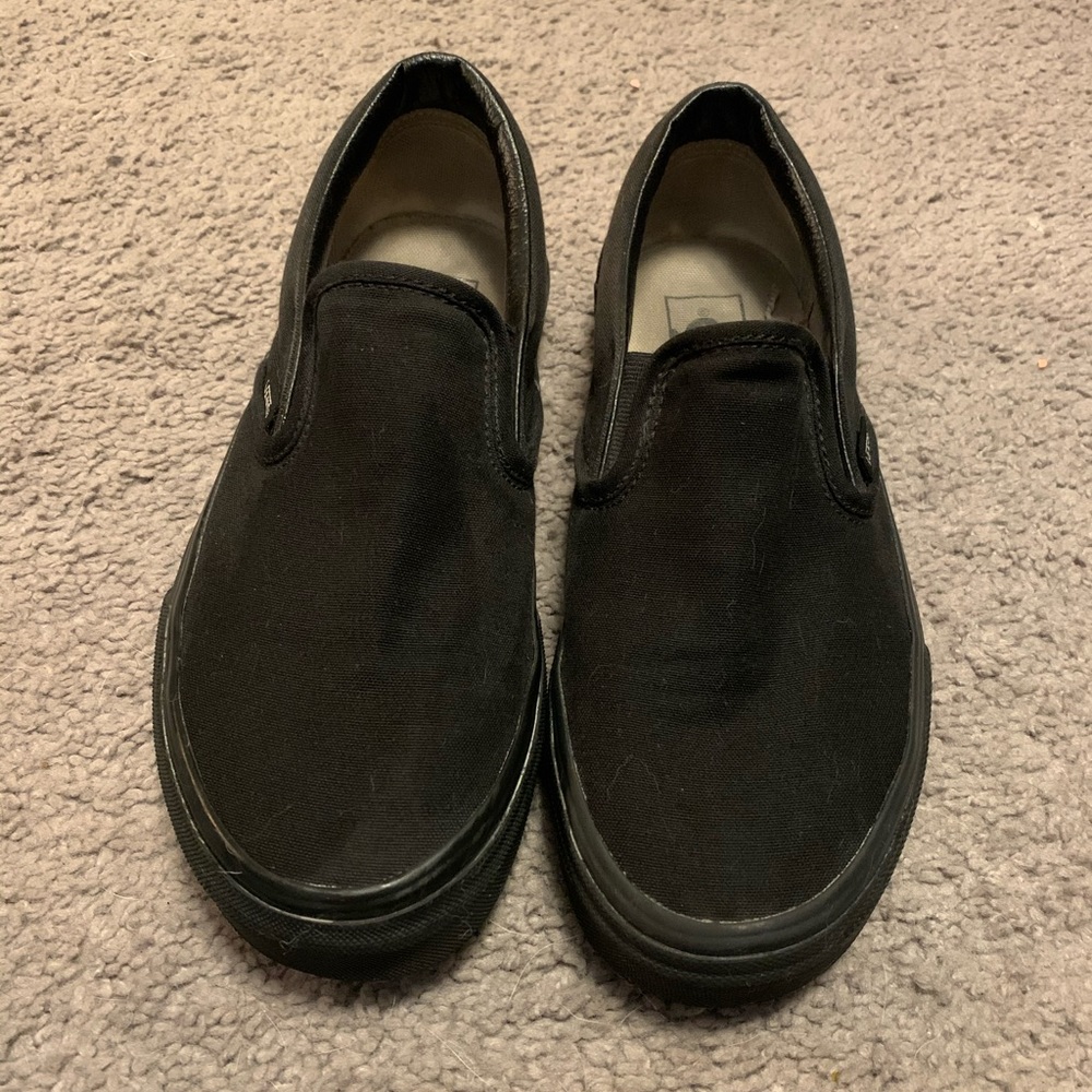 Woman’s size 7 black vans